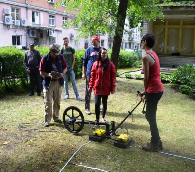 Research team collecting ground-penetrating radar data at the Great Synagogue of Vilnius site.