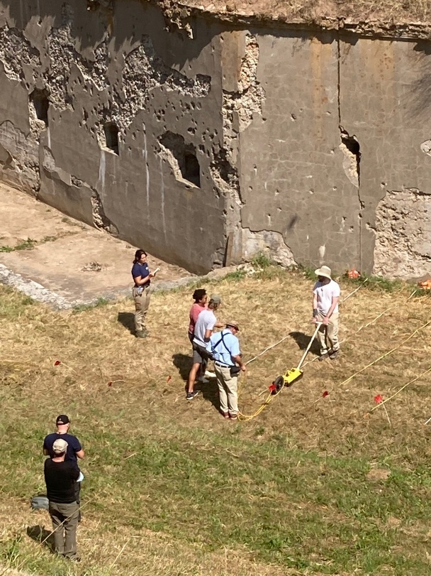 Researchers collecting ground-penetrating radar data beside the Ninth Fort in Kaunas.