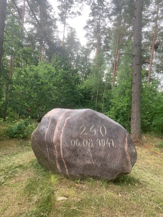Memorial stone at Sabile marking the murder of 240 Jewish victims on August 6, 1941.