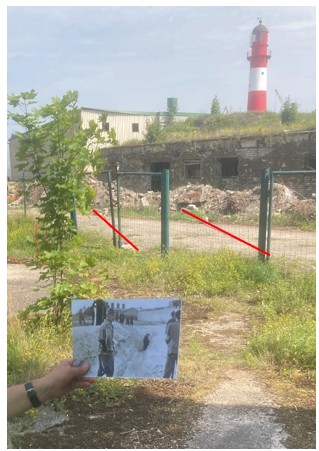 Modern site photograph with a Wiener-film still held in the foreground and two red lines marking the estimated position of the burial trench anomaly.