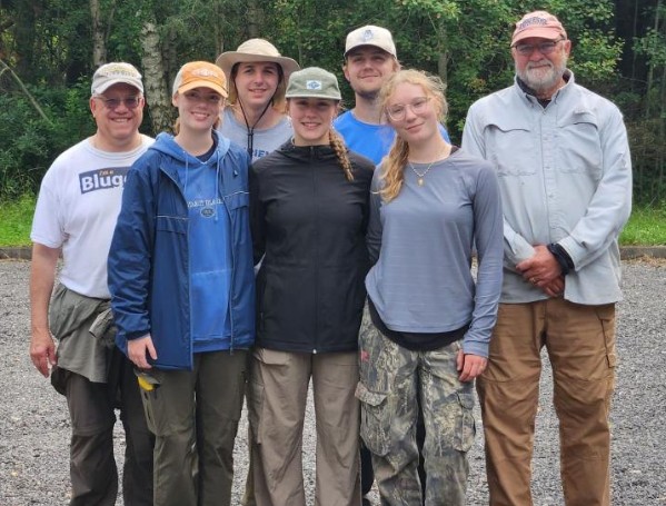 The 2026 research team standing outdoors.